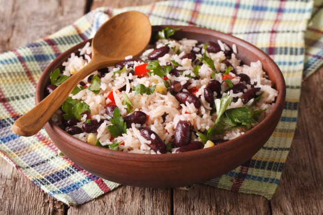 rice with red beans in a bowl close-up on the table.